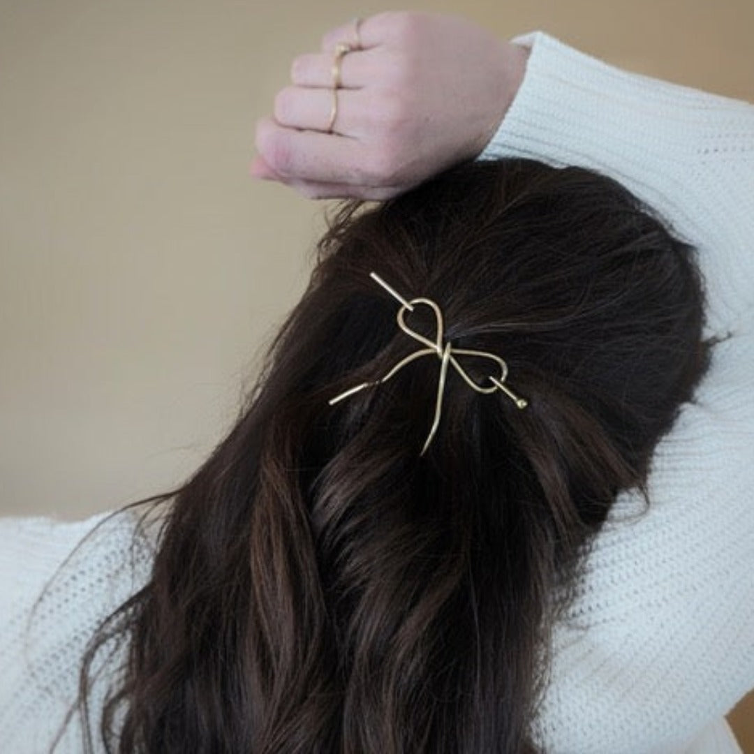 Brass Bow Hairpin brunette woman model