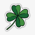 A vibrant, cartoon-style sticker of a four-leaf clover with varying shades of green, outlined with a thick black border.