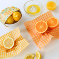Yellow Beeswax Wrap Variety Set is a set of 3 beeswax food wraps in small, medium and large.