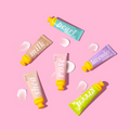 6 tubes of lotion in colourful tubes on a pink background.