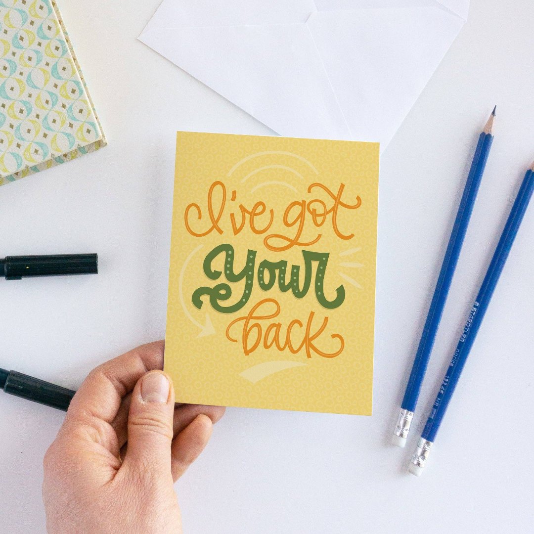 A card with a yellow background and the text "I've got your back" in green and orange lettering.