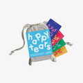 Set of colorful 'happy tears' cards with a gray drawstring bag on a white background